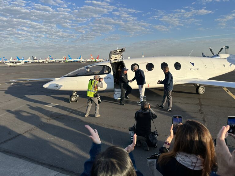 Well-wishers greet test pilot Steve Crane as he emerges from the cockpit.