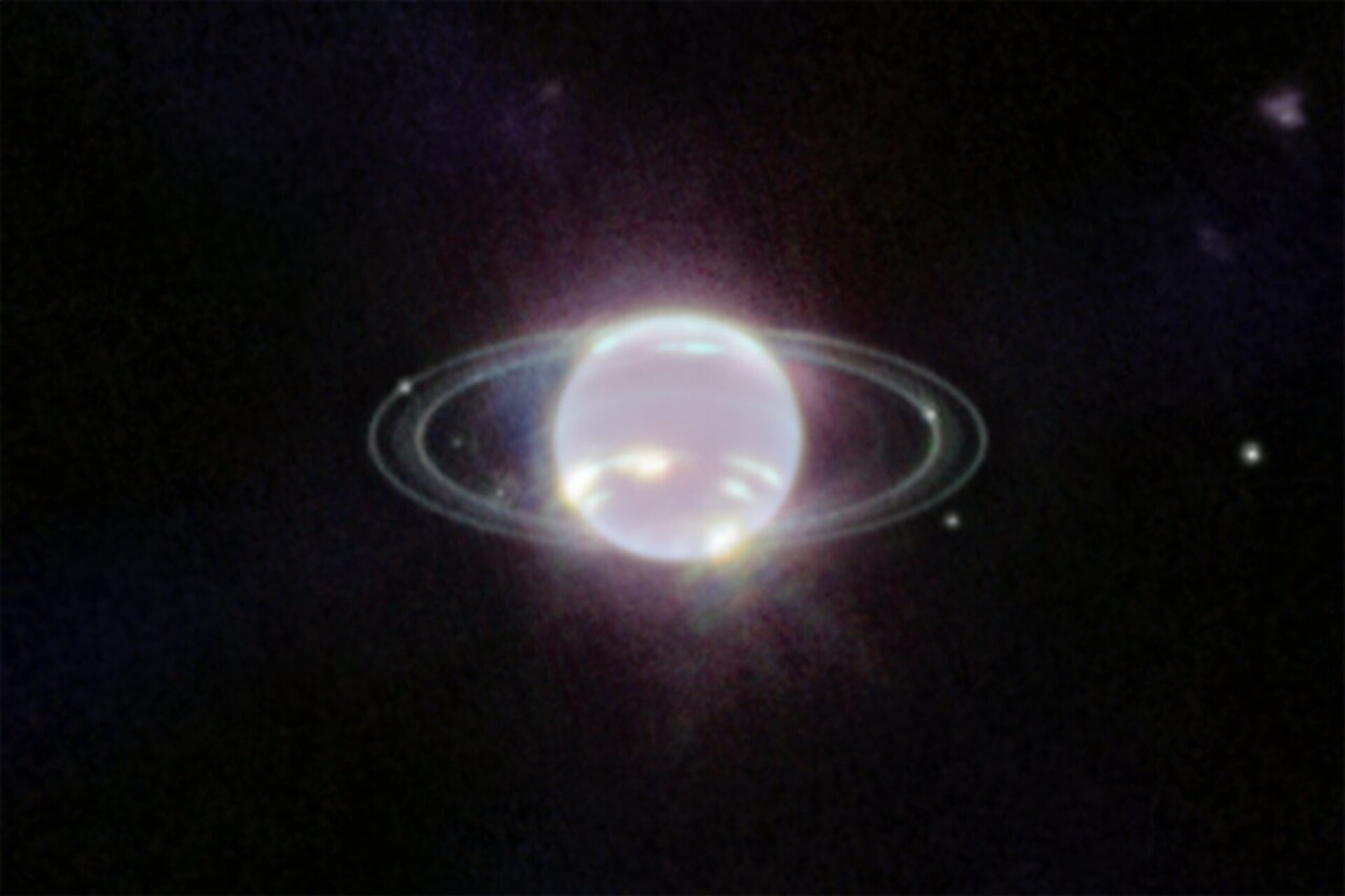 Webb’s Near-Infrared Camera (NIRCam) image of Neptune, taken on 12 July 2022, brings the planet’s rings into full focus for the first time in more than three decades. The most prominent features of Neptune’s atmosphere in this image are a series of bright patches in the planet’s southern hemisphere that represent high-altitude methane-ice clouds. More subtly, a thin line of brightness circling the planet’s equator could be a visual signature of global atmospheric circulation that powers Neptune’s winds and storms. Additionally, for the first time, Webb has teased out a continuous band of high-latitude clouds surrounding a previously-known vortex at Neptune’s southern pole.