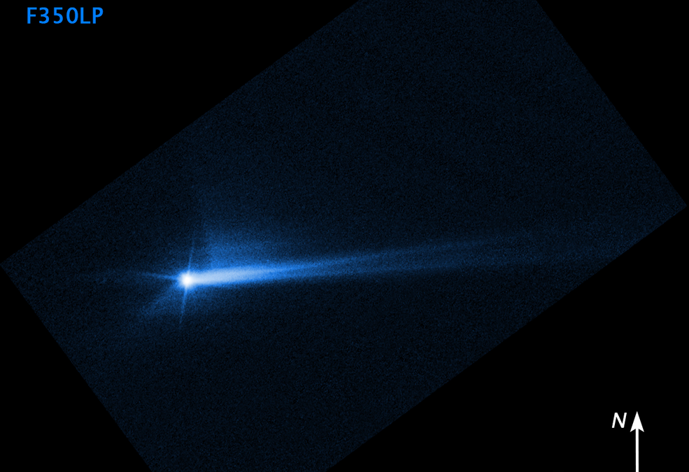 This image taken by Hubble shows debris erupting from the surface of the Dimorphos