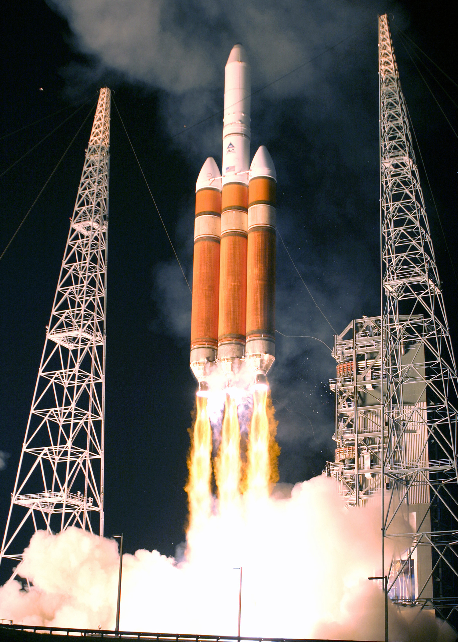CAPE CANAVERAL, Fla. -- Defense Support Program flight 23 takes off into the night Nov. 10 aboard Boeing's new Delta IV Heavy Evolved Expendable Launch Vehicle. Flight 23 marked the end of a 36-year era of DSP satellites. The program will be succeeded by the Space-Based Infrared System program.