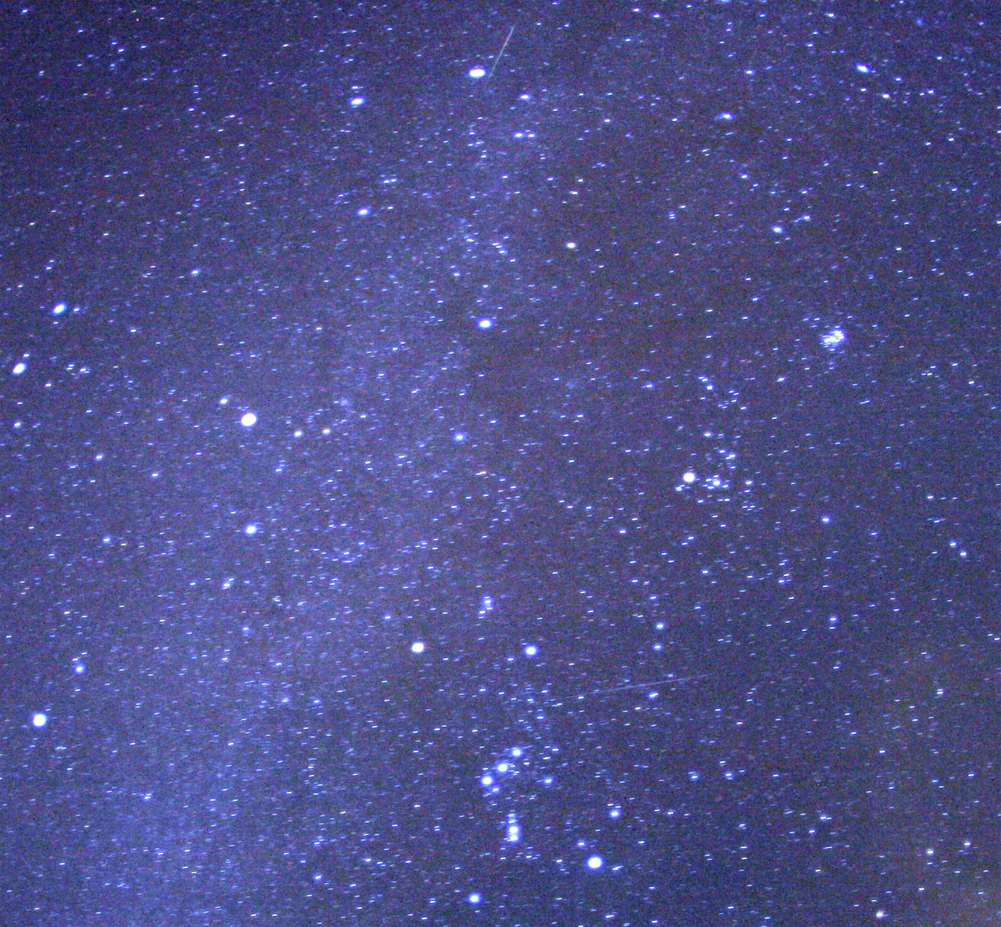 Two Orionids and the Milky Way.