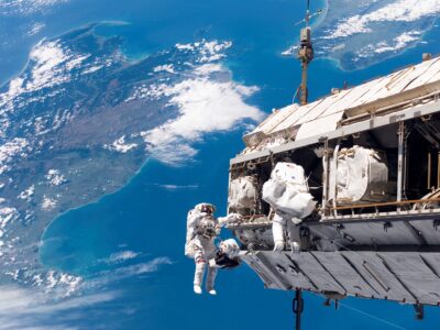 Space suits being used to work on the International Space Station.