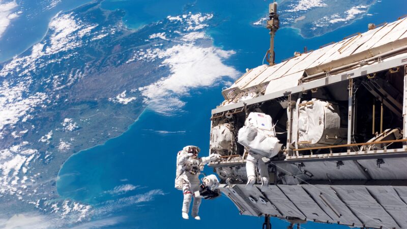 Space suits being used to work on the International Space Station.
